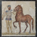 233px-Mosaic_blue_charioteer_Massimo